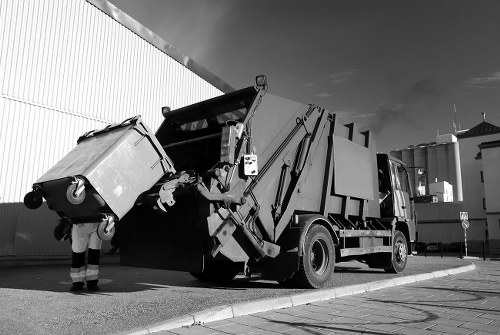 Construction site with waste clearance services in action