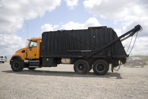 Professional waste clearance team handling construction debris